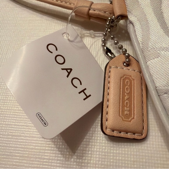 NWT Coach white canvas/leather and Tan Wristlet, matching accessories available